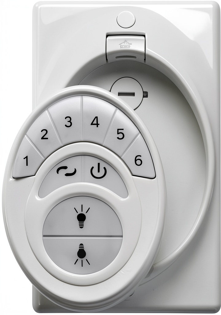 Kichler ceiling fan remote control in a modern living room setting
